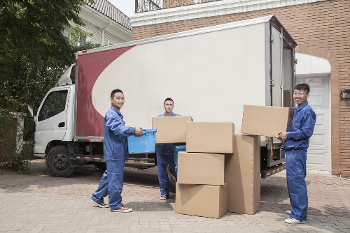 Removal team planning a move in a Paddington street with nearby residential buildings
