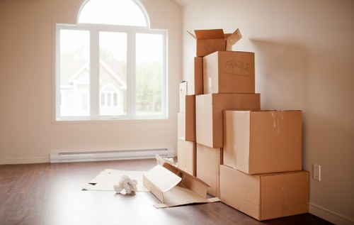 Mover handling boxes and furniture for a local Paddington job