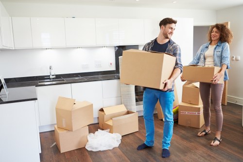 Professional packers organising boxes for a Paddington home or office relocation