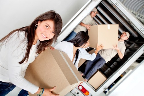 Local moving team loading furniture near Paddington streets