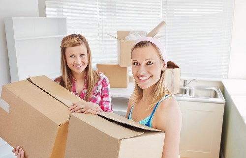 Packed boxes and furniture loaded for a Paddington relocation