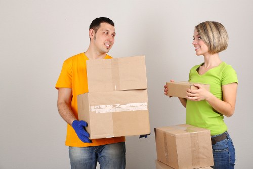 Local removals team handling furniture in Paddington streets