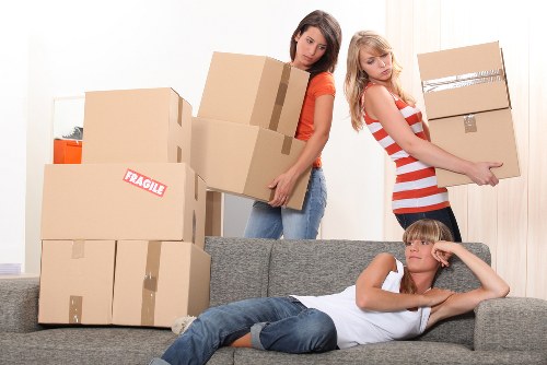 Professional movers coordinating a commercial relocation near Paddington Station